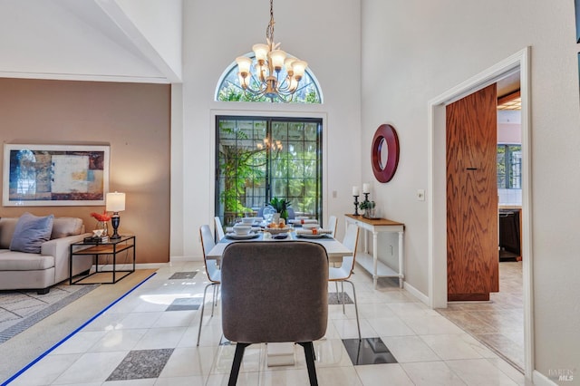 271 Antigua Way, Vallejo, CA 94591 - dining area with a chandelier, healthy amount of natural light, baseboards, light tile patterned flooring, and a high ceiling