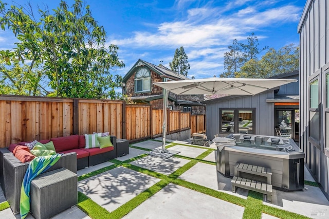 1108 Raymond Ave, Napa, CA 94559 - view of patio / terrace featuring a jacuzzi, an outdoor hangout area, and a fenced backyard