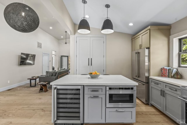 1108 Raymond Ave, Napa, CA 94559 - kitchen with light wood-style flooring, wine cooler, appliances with stainless steel finishes, and gray cabinetry