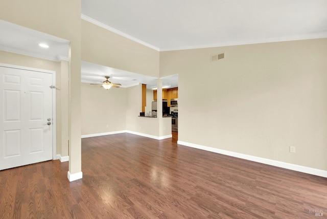 unfurnished living room featuring visible vents, baseboards, ornamental molding, and dark wood-style floors