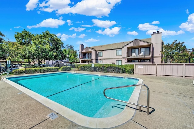 pool featuring fence