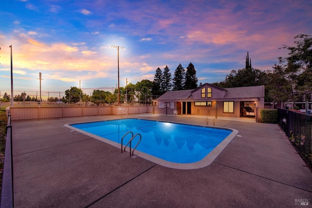 view of swimming pool with fence, a patio, and a fenced in pool