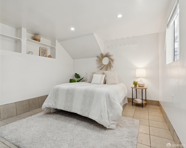 tiled bedroom with recessed lighting and vaulted ceiling