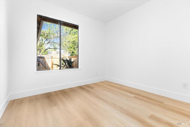 850 E Cotati Ave Unit 13, Cotati, CA 94931 - spare room featuring wood finished floors and baseboards