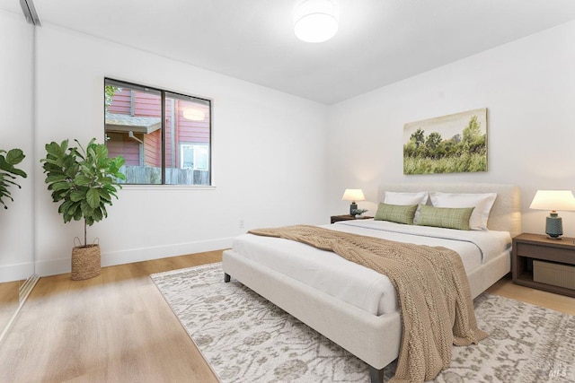 850 E Cotati Ave Unit 13, Cotati, CA 94931 - bedroom with baseboards and wood finished floors