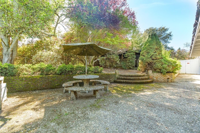 view of yard with a patio and fence
