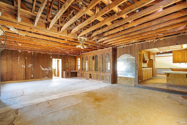miscellaneous room with a wealth of natural light and concrete floors