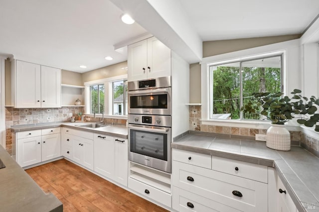 4040 Burnside Rd, Sebastopol, CA 95472 - full bathroom with tile patterned flooring, vanity, and shower / bath combo with shower curtain