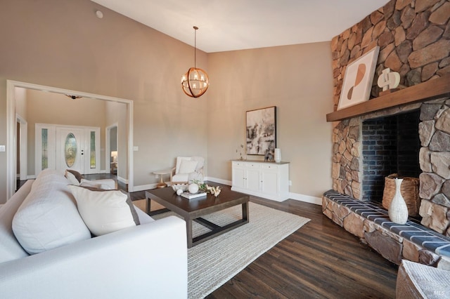 146 Shelina Vista Ln, Petaluma, CA 94952 - living room featuring baseboards, a notable chandelier, a fireplace, dark wood-style floors, and high vaulted ceiling