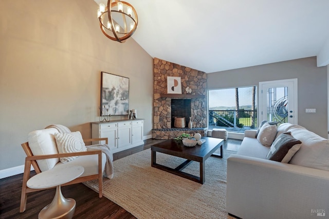 146 Shelina Vista Ln, Petaluma, CA 94952 - living room with baseboards, a notable chandelier, a fireplace, dark wood finished floors, and high vaulted ceiling