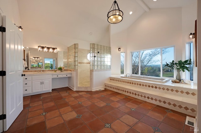 146 Shelina Vista Ln, Petaluma, CA 94952 - bathroom featuring high vaulted ceiling, a bath, vanity, tile patterned flooring, and walk in shower