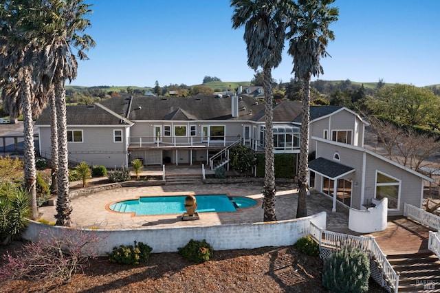 146 Shelina Vista Ln, Petaluma, CA 94952 - back of house featuring a fenced in pool, a deck, a patio, and stairs
