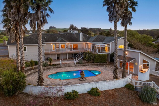 146 Shelina Vista Ln, Petaluma, CA 94952 - rear view of property featuring a deck, fence, a patio, stairs, and a fenced in pool