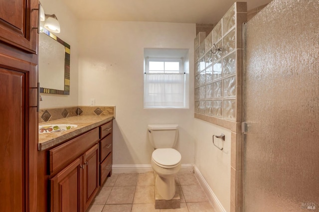 146 Shelina Vista Ln, Petaluma, CA 94952 - bathroom featuring vanity, baseboards, tile patterned flooring, toilet, and a shower stall
