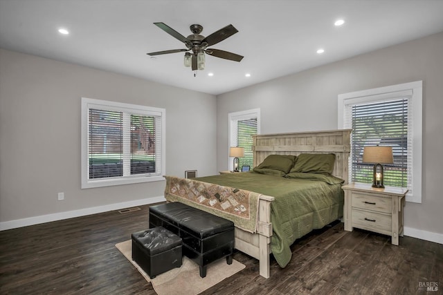 bedroom featuring recessed lighting, dark wood-style floors, and baseboards