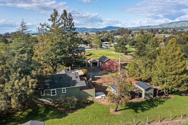 birds eye view of property with a mountain view