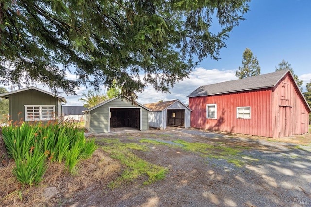 exterior space featuring dirt driveway
