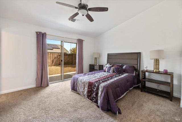 bedroom with access to outside, visible vents, vaulted ceiling, carpet floors, and baseboards