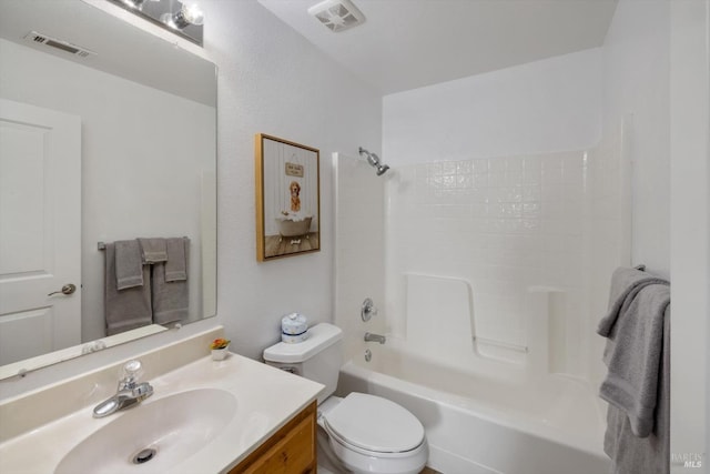bathroom with visible vents, toilet, bathtub / shower combination, and vanity