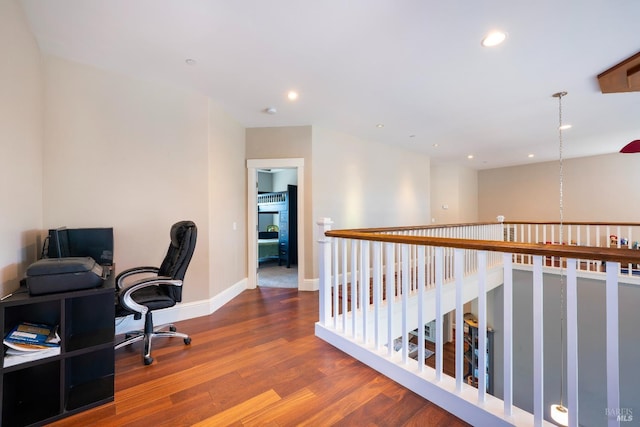office area with baseboards, recessed lighting, and wood finished floors