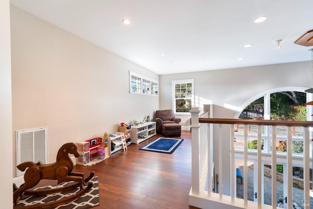 sitting room featuring visible vents, recessed lighting, an upstairs landing, and hardwood / wood-style flooring