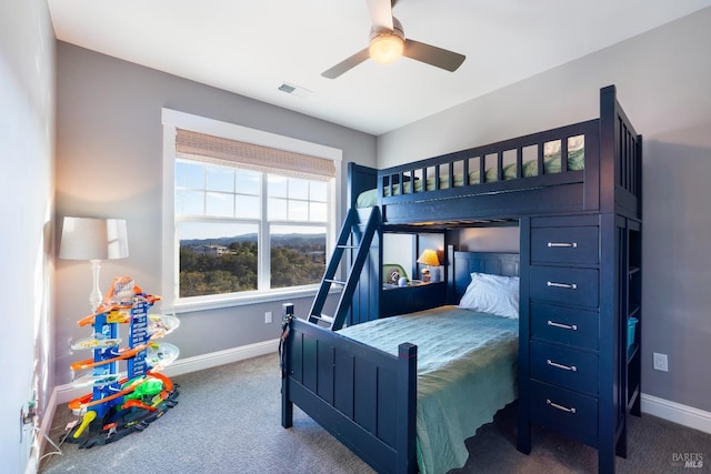 bedroom with baseboards, ceiling fan, carpet, and visible vents