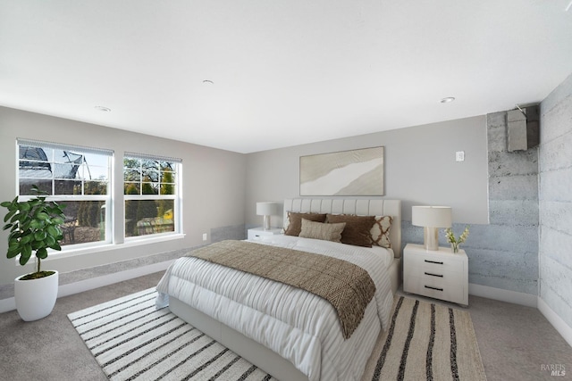 carpeted bedroom with baseboards