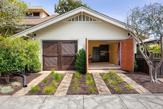 garage featuring fence