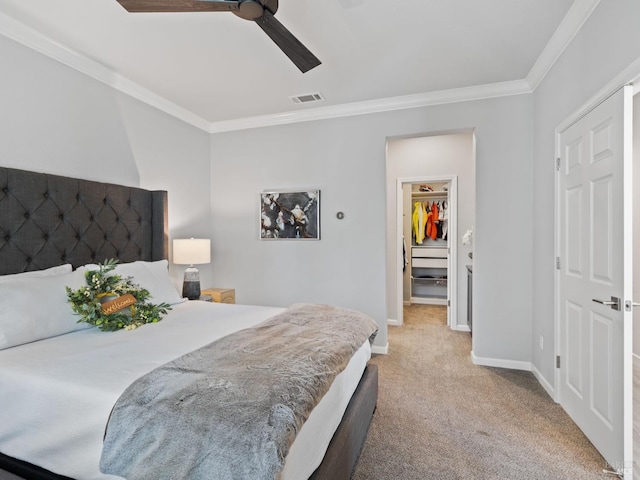 carpeted bedroom with crown molding, visible vents, and baseboards