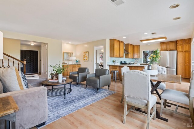 263 Carlisle Way, Benicia, CA 94510 - living room featuring light wood-type flooring, recessed lighting, and stairway