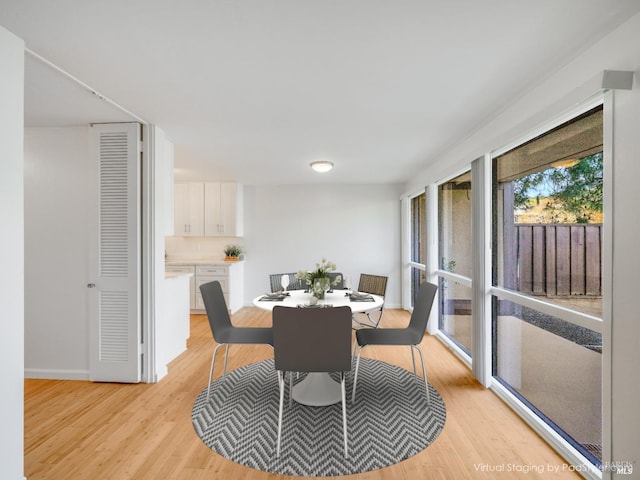 27 Forest Ln, San Rafael, CA 94903 - dining room with light wood finished floors and baseboards