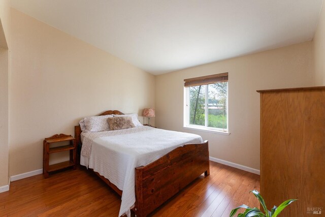 13679 Powerhouse Rd, Potter Valley, CA 95469 - bedroom featuring baseboards and wood finished floors