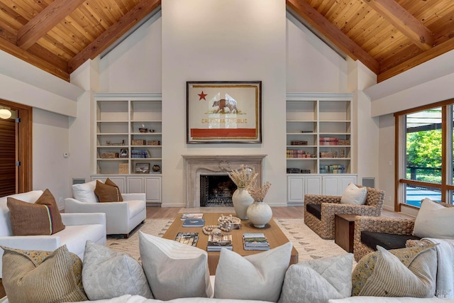 living room featuring a premium fireplace, wooden ceiling, and wood finished floors