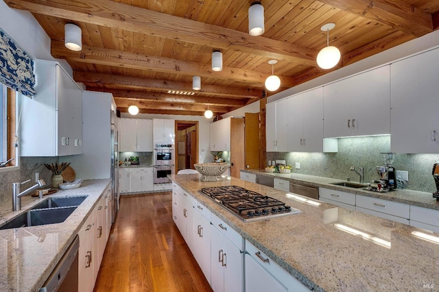 living room with french doors, light wood-style flooring, wooden ceiling, and beam ceiling