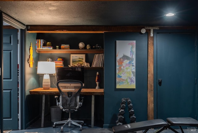 office area featuring concrete floors