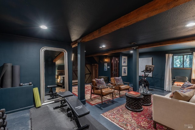 interior space featuring baseboards, recessed lighting, and a textured ceiling