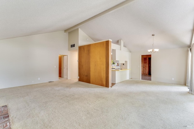 1740 Sereno Dr, Vallejo, CA 94589 - unfurnished living room with visible vents, a chandelier, beamed ceiling, high vaulted ceiling, and light colored carpet