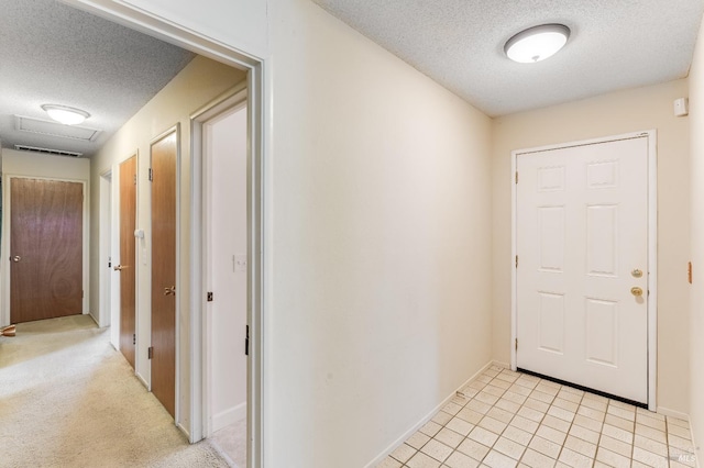 1740 Sereno Dr, Vallejo, CA 94589 - hall with visible vents, a textured ceiling, and baseboards