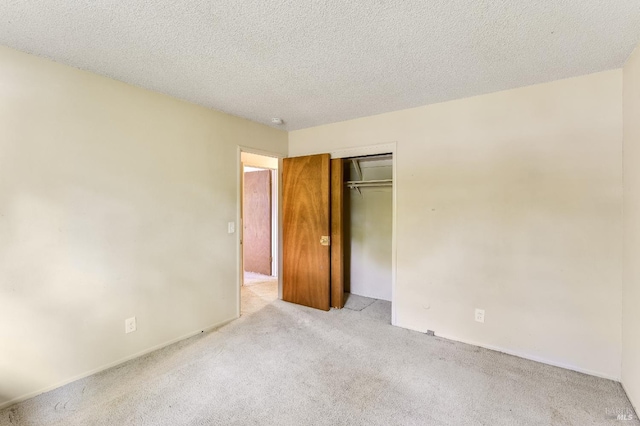 1740 Sereno Dr, Vallejo, CA 94589 - unfurnished bedroom with a closet, baseboards, light colored carpet, and a textured ceiling