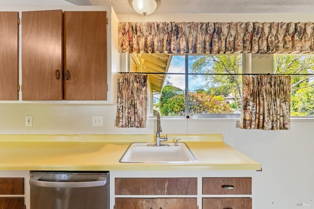 1740 Sereno Dr, Vallejo, CA 94589 - kitchen featuring a sink, light countertops, and dishwasher