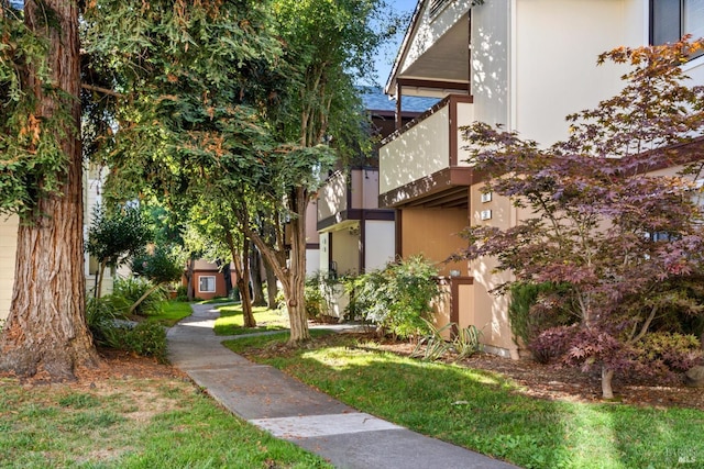 surrounding community featuring a lawn