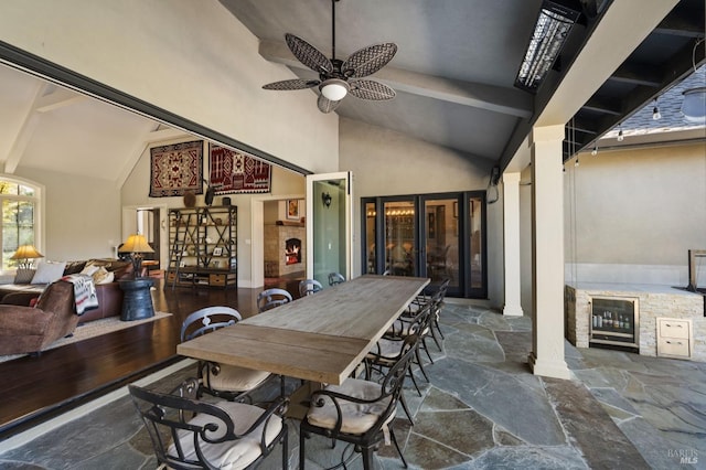view of patio featuring outdoor dining space and ceiling fan