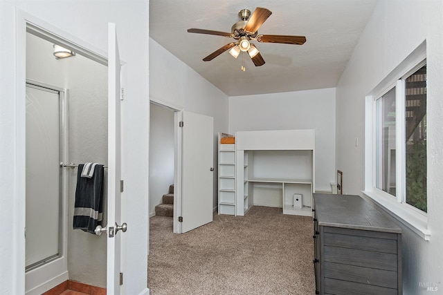 interior space featuring ceiling fan