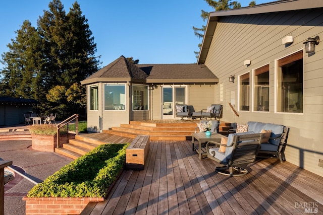 deck featuring outdoor lounge area