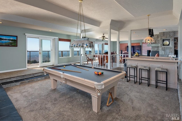 playroom featuring baseboards, billiards, a fireplace, a ceiling fan, and carpet floors