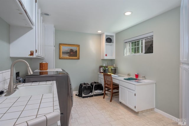 clothes washing area featuring laundry area, baseboards, and recessed lighting