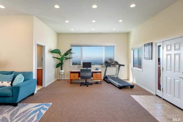 carpeted office space with baseboards and recessed lighting