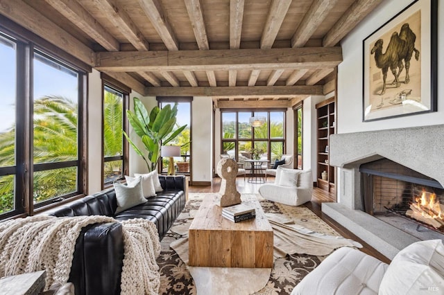 sunroom with beamed ceiling