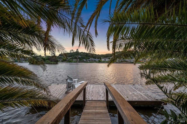view of dock with a water view