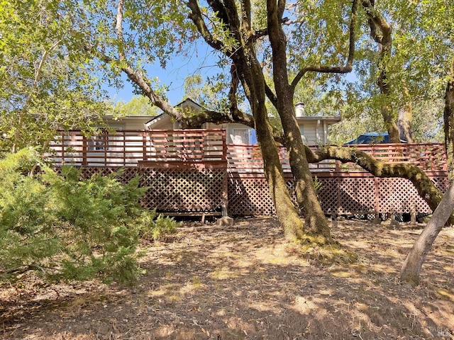 view of yard with a deck